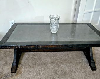 Vintage 48" trestle table with a zinc countertop.