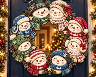 May include: A circular Christmas wreath featuring eight snowman ornaments with personalized names including Grandpa, Grandma, Oliver, Noah, Liam, Amelia, Charlotte, and Ava. Each snowman wears a colorful knit hat and scarf with festive accents.
