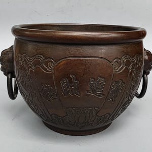 Jarrón de tigre tallado en bronce vintage
