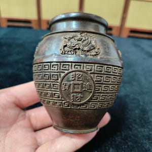 Vintage brons snidad lyckokruka