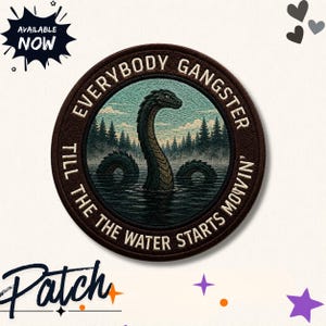 May include: A circular embroidered patch featuring a dark green sea serpent emerging from a lake surrounded by a forest. The border is dark brown with the text "EVERYBODY GANGSTER TILL THE WATER STARTS MOVIN'" in cream-colored capital letters.