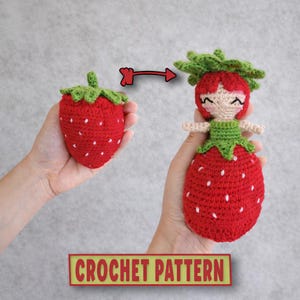 May include: A red crocheted strawberry doll with white seed details and green leaves. The doll has a smiling face, red hair, and beige arms. The text "CROCHET PATTERN" is displayed on a green and red sign.