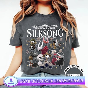 Puede incluir: Camiseta gris oscuro con el texto "HOLLOW KNIGHT SILKSONG" y personajes de dibujos animados. La camiseta también tiene el texto "COMFORT COLORS PEPPER" y "PNG DIGITAL DOWNLOAD".