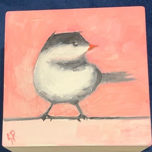 Chickadee on a wire