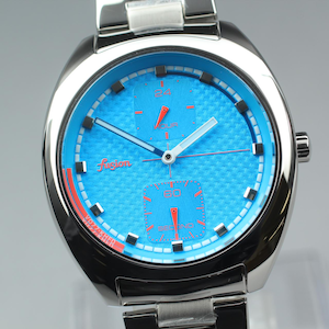 May include: A stainless steel wristwatch with a vibrant blue face and a textured pattern. The watch features red accents, including the hands and the word "fusion" in a cursive font. The watch has a silver band and a round face.
