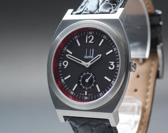 Reloj de pulsera de cuarzo para hombre Dunhill RPM 8034 con segundero pequeño y esfera negra, en estado casi impecable, fabricado en Japón.