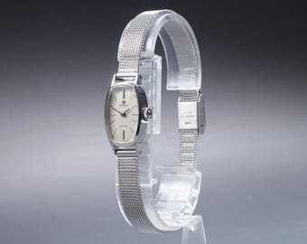 Reloj Omega De Ville Cal.485 de cuerda manual, plateado, para mujer, procedente de Japón, modelo W1784, en estado casi impecable.