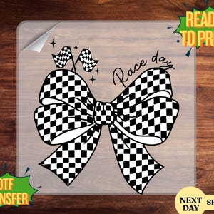 May include: A black and white checkered bow design with two checkered flags and the words "Race day". The image also includes the text "Ready to press" and "DTF Transfer".