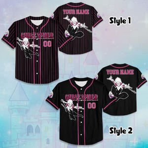 May include: Two baseball jerseys, one black with pink trim and the other black with pink pinstripes. Both feature a Ghost-Spider graphic, the text "GHOST-SPIDER 00", and the option to add a name on the back. The jerseys have short sleeves.