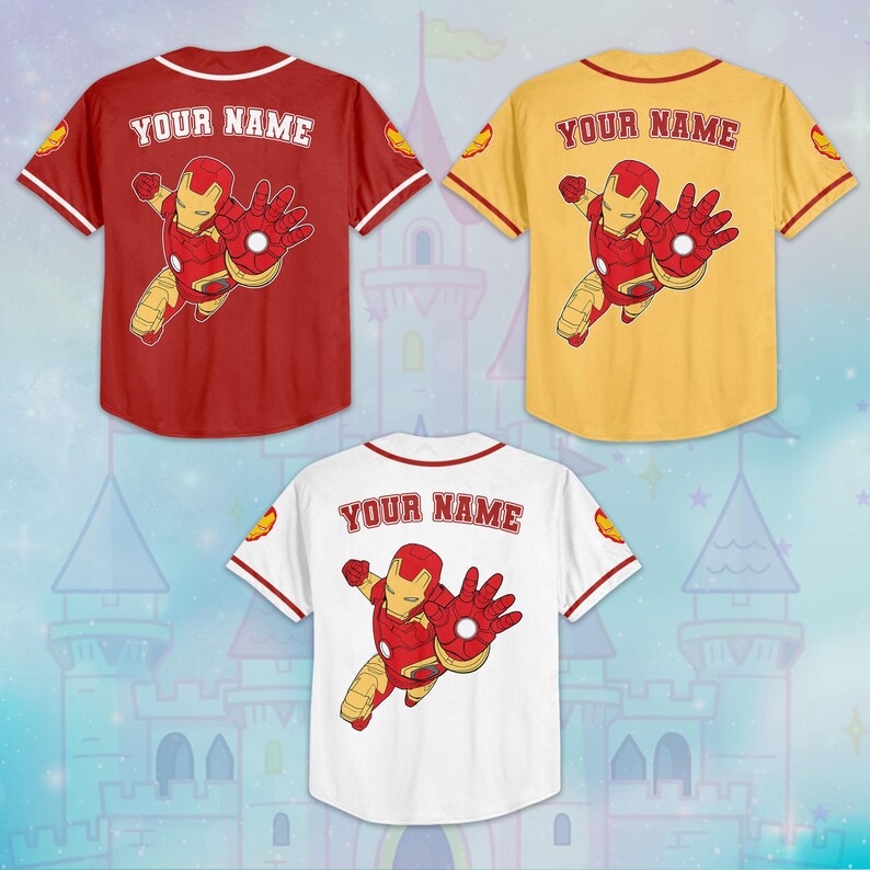 May include: Three baseball jerseys in red, yellow, and white, each featuring an Iron Man graphic on the back. The text "YOUR NAME" is above the graphic. The jerseys have contrasting color trim and Iron Man logo patches on the sleeves.