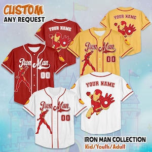 May include: Baseball jerseys in red, yellow, and white, featuring Iron Man graphics. Each jersey has the text "Iron Man" and the number "00". Some jerseys have "YOUR NAME" printed on the back. The image also includes the text "CUSTOM ANY REQUEST" and "IRON MAN COLLECTION Kid/Youth/Adult".