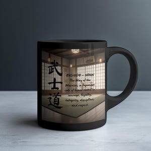 May include: Black ceramic mug with a Japanese interior design and the text "BUSHIDO - NOUN" and Japanese characters. The text describes the Way of the Warrior, a Japanese code of honor rooted in courage, loyalty, integrity, discipline, and respect.