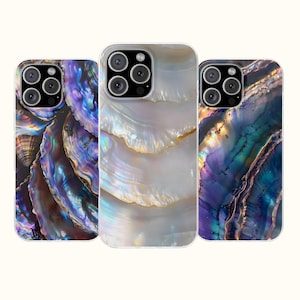 May include: Three smartphone cases featuring high-resolution prints of iridescent abalone and mother-of-pearl shell textures. The left case displays deep blues and purples, the center case shows white pearlescent layers, and the right case features teal and gold tones.
