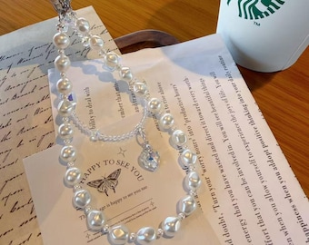 スワロフスキー ホワイトパール フォンチャーム