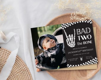 May include: A black and white birthday invitation with the text "BAD TWO the BONE" and a skeleton hand graphic. The invitation includes details for Jackson's 2nd birthday celebration.