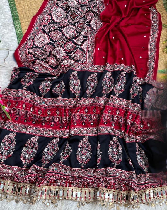 Soft silk Ajrakh Print Saree with  Real Mirror Work Designer Mirror Lace Border