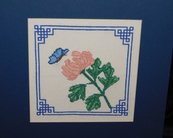 Vtg Pink Geranium Flower Blue Butterfly Cross Stitch Picture Completed Matted Textile Art With Stitched Border Spring Summer