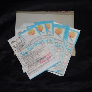 Lote 12 Vintage Hallmark Nuevas tarjetas de bebé 1040 Expemption de impuestos dulce lindo dependiente de retorno conjunto contrats sin usar con sobres