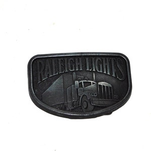 Vintage Raleigh Lights Trucker Belt Buckle Big Rig 18 Wheeler Metal