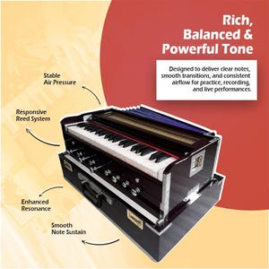 May include: A dark brown wooden harmonium featuring a keyboard with white and black keys, a set of silver metal knobs, and a blue bellows system. The instrument includes text labels for Stable Air Pressure, Responsive Reed System, Enhanced Resonance, and Smooth Note Sustain, plus a box with the text Rich, Balanced & Powerful Tone.