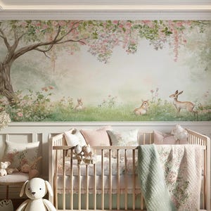 May include: A nursery scene featuring a light wood cot with floral bedding and pillows. The wall has a mural of a forest scene with deer and rabbits. Soft toys and a small chair complete the room's decor.