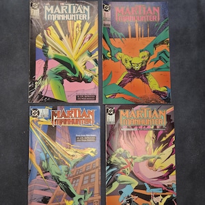Może przedstawiać: Cztery komiksy z serii Martian Manhunter, każdy z kolorowymi ilustracjami zielonoskórej postaci w akcji. Okładki prezentują tytuł Martian Manhunter stylizowaną czcionką, wraz z numerami wydań oraz informacjami o twórcach.