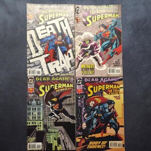 Op de afbeelding: Vier DC Comics Superman-stripboeken uit de Dead Again-serie. De covers tonen Superman in zijn blauw-rode pak, met titels zoals Death Trap, Mind Held en Body of Evidence, die verschillende actiescènes in een stedelijke omgeving weergeven.