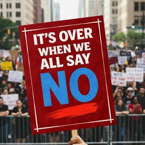 May include: A red protest sign with white borders and text that reads "IT'S OVER WHEN WE ALL SAY NO" in white and blue. A red line underlines the word "NO". The sign is held up in a crowd of people.