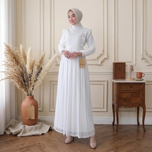 May include: A set of three ceramic mugs with a speckled, matte finish. The mugs are in shades of cream, light brown, and dark brown. Each mug has a simple, minimalist design, perfect for coffee or tea.