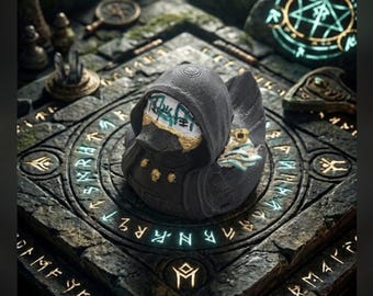 May include: A dark gray rubber duck wearing a hooded cloak, positioned on a stone platform engraved with glowing blue runes. The duck features gold accents and a white mask-like detail on its face, surrounded by scattered crystals and stone relics.