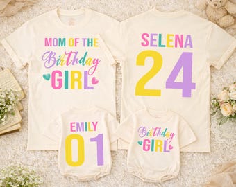 May include: Four cream-colored t-shirts and onesies with colorful text. One shirt says "Mom of the Birthday Girl" and another says "Selena 24". The onesies say "Emily 01" and "Birthday Girl".