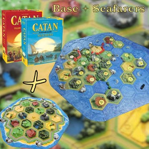 May include: A board game set with two boxes labeled "CATAN" and "CATAN Expansion Seafarers". The game board is blue with hexagonal tiles representing land and sea. The text "Base + Seafarers" is at the top.