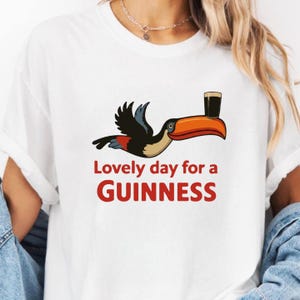 May include: A white ceramic mug with a black handle and the text "But First, Coffee" in a black, bold font. The mug is approximately 10 cm tall and holds about 350 ml of liquid.