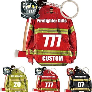 May include: Keychains featuring miniature firefighter jackets in red, yellow, and black, with a helmet and axe charm. The jackets have reflective stripes and the text "Firefighter Gifts", "777", "Custom", "Key Biscayne", and numbers.