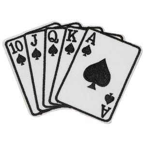 May include: A white patch featuring a poker hand of spades: 10, Jack, Queen, King, and Ace. Each card has a black spade symbol and black border. The cards are arranged in a fanned-out pattern.