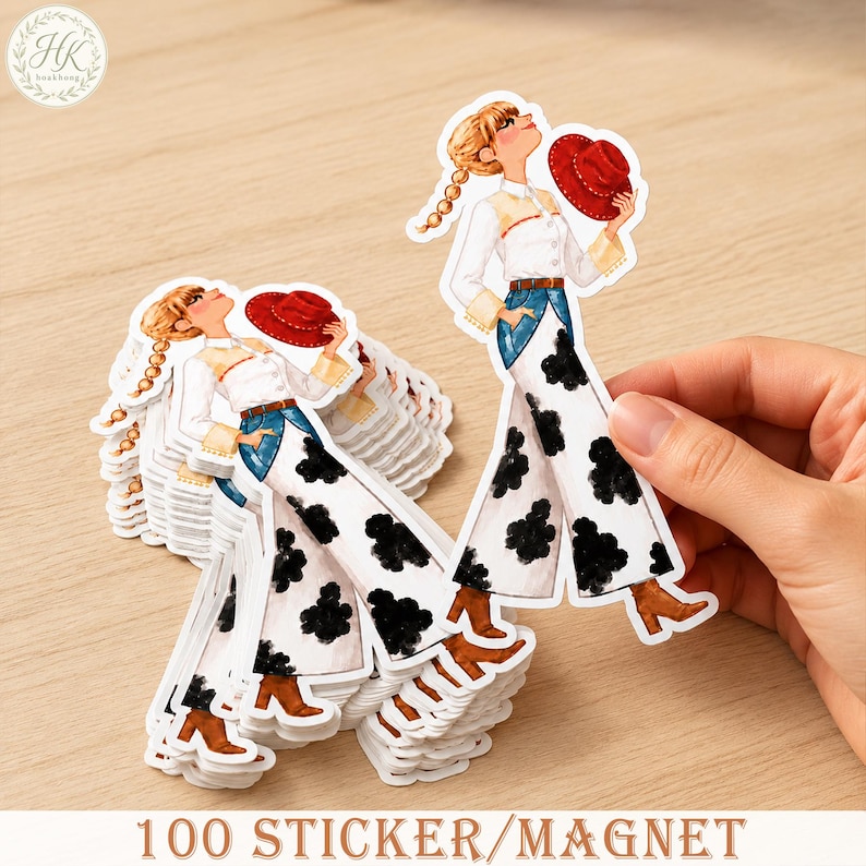 May include: A stack of die-cut stickers featuring a blonde character with braided hair wearing a white shirt, blue denim-style pants with black cow-print patterns, brown boots, and holding a red hat. The text 100 STICKER/MAGNET is visible.