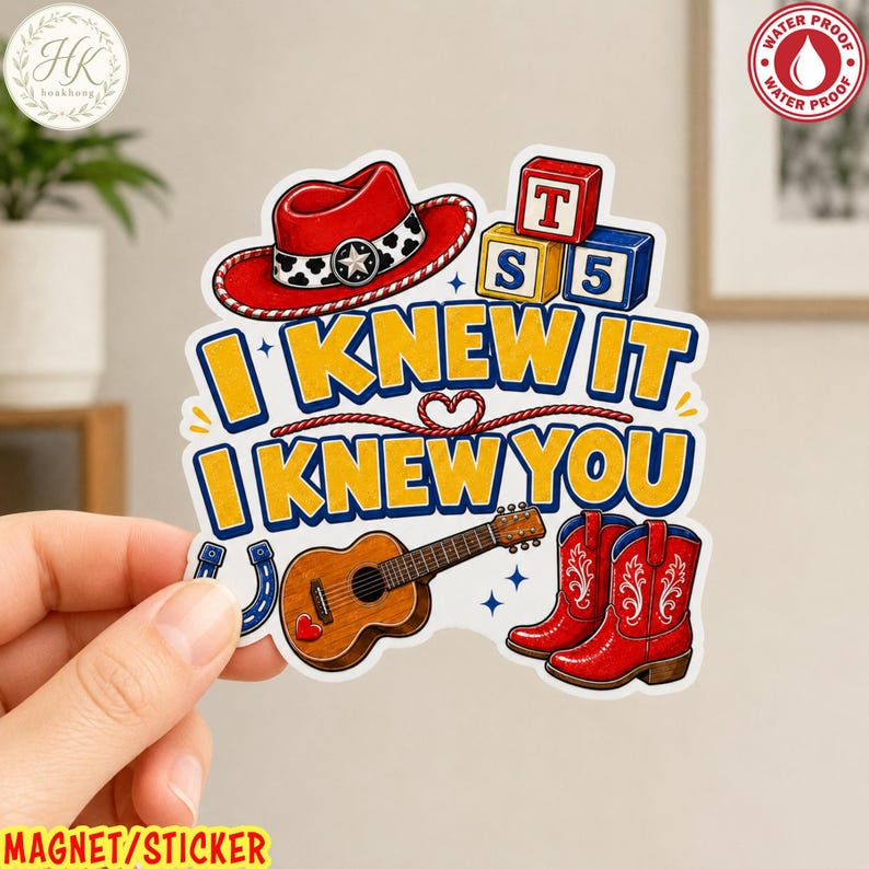 May include: A die-cut sticker featuring a red cowboy hat, two alphabet blocks with letters T and S and the number 5, a brown acoustic guitar with a small red heart, and red cowboy boots. The text reads I KNEW IT I KNEW YOU in yellow letters.
