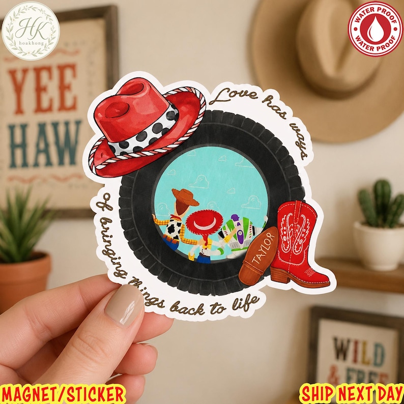 May include: A die-cut sticker featuring a black tire frame surrounding a scene with three cartoon characters. A red cowboy hat sits on top, a red cowboy boot is on the right, and the text reads Love has ways of bringing things back to life.