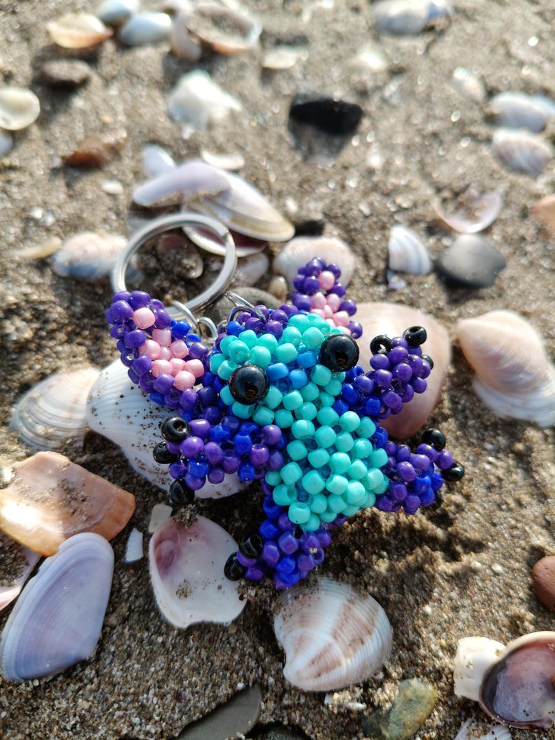Beaded Keychain ​Stitch Bag Charm ​Handmade Gift ​Disney Fan Art ​Blue Purple Stitch ​Beadwork Animal ​Pixel Art Charm ​Cute Accessory ​Stocking Stuffer ​Lilo and Stitch ​Unique Keychain ​Boho Bag Decor ​Personalized Gift