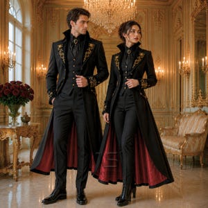 May include: Two long black coats with gold embroidery on the lapels and cuffs, worn over black vests, shirts, and trousers. The coats feature a deep red lining visible at the hem. Both outfits include dark neckwear with a central gold brooch.