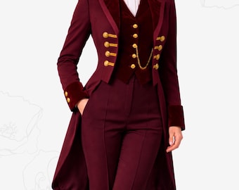 May include: A burgundy three-piece suit with a long coat, vest, and trousers. The coat features gold buttons and velvet accents on the collar and cuffs. The vest has gold buttons and a gold chain. The suit is a formal style.