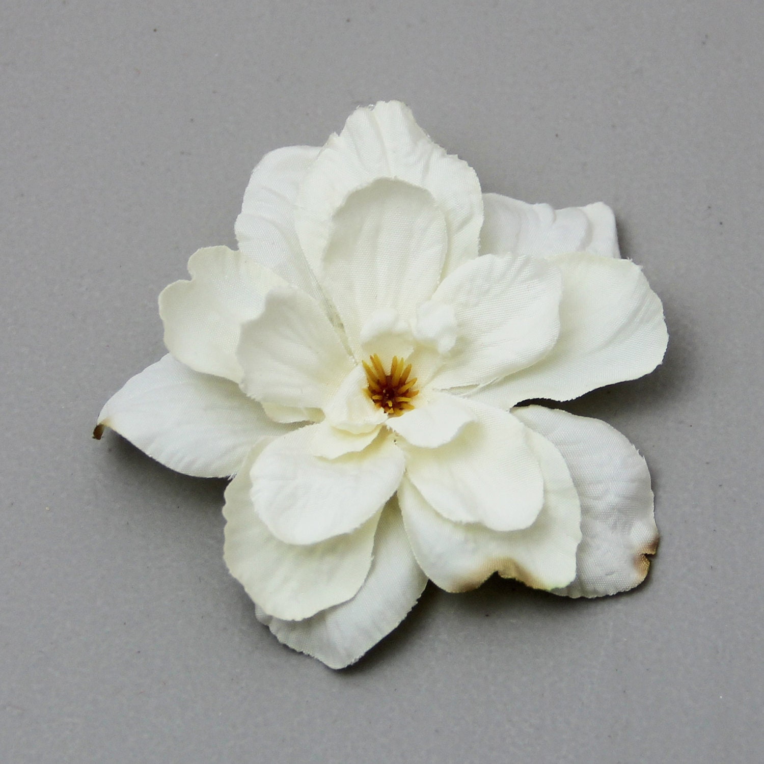 Image of Side ponytail with a flower clip