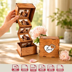May include: A wooden box with a pull-out accordion photo display featuring four square images of a couple. The exterior of the box is engraved with a heart shape and the text "WITH Love". The box is constructed from stained wood panels.