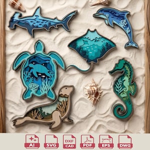 May include: A selection of layered wooden sea creatures, including a shark, dolphin, turtle, stingray, seahorse, and seal. The designs feature shades of blue, green, and brown, arranged on a sandy surface with seashells.