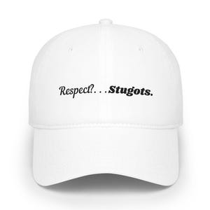 May include: White baseball cap with a curved brim. The cap features the text "Respect?...Stugots." in black, centered on the front. The hat is a classic style, suitable for casual wear.
