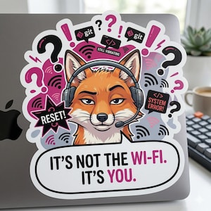 May include: A sticker with a cartoon fox wearing a headset, surrounded by question marks, exclamation marks, and Wi-Fi symbols. Text reads "IT'S NOT THE WI-FI. IT'S YOU." Other text includes "RESET!" and "SYSTEM ERROR!"