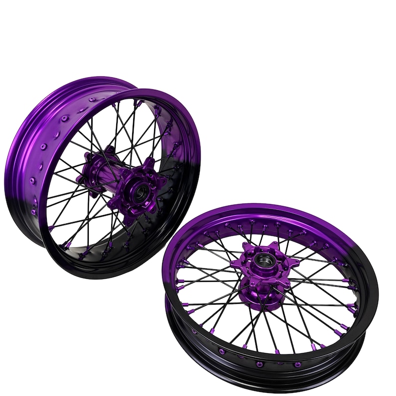 May include: Two motorcycle wheels with a vibrant purple and black color scheme. The rims and hubs are a bright purple, while the outer edges fade to black. The wheels have black spokes and are set against a white background.