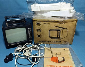 A legendary vintage black-and-white “Elektronika-409D” TV from the Soviet Union, complete with accessories, in excellent condition.