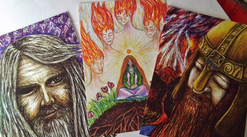 May include: Three illustrated cards with a fantasy theme. The first card features a bearded man with long white hair. The second card shows a woman with long red hair sitting in a forest with a sun and five figures with flames behind her. The third card shows a man with a beard and a helmet with his eyes closed.