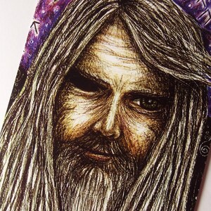 May include: A black and white drawing of a man with long, flowing hair and a beard. He has a serious expression on his face and is surrounded by runes.